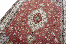 Backside of handmade 2000s Tabriz 50/60/70 Raj rug showing knot structure and weave density