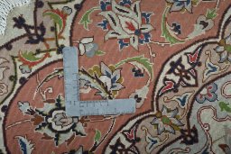 Corner detail of 2000s Tabriz 50/60/70 Raj rug showing border pattern and Cork pile