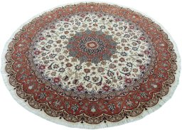 Corner detail of 2000s Tabriz 50/60/70 Raj rug showing border pattern and Cork pile