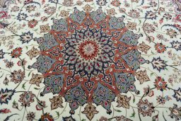 Backside of handmade 2000s Tabriz 50/60/70 Raj rug showing knot structure and weave density