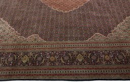 Corner detail of 1970s Tabriz 50/60/70 Raj rug showing border pattern and Cork pile