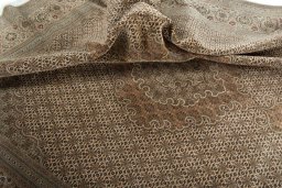 Surface texture of 2000s Tabriz 50/60/70 Raj rug with natural Cork and intricate pattern