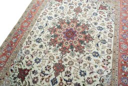 Backside of handmade New Tabriz 50/60/70 Raj rug showing knot structure and weave density