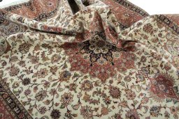 Surface texture of 2000s Tabriz 50/60/70 Raj rug with natural Cork and intricate pattern