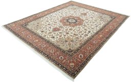 Corner detail of 2000s Tabriz 50/60/70 Raj rug showing border pattern and Cork pile