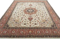 Surface texture of 2000s Tabriz 50/60/70 Raj rug with natural Cork and intricate pattern