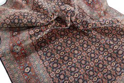 Corner detail of New Tabriz 50/60/70 Raj rug showing border pattern and Cork pile