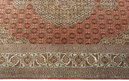 Corner detail of New Tabriz 50/60/70 Raj rug showing border pattern and Cork pile