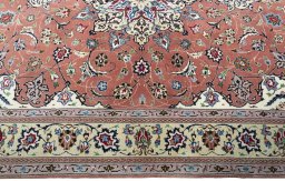Corner detail of New Tabriz 50/60/70 Raj rug showing border pattern and Cork pile
