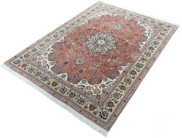 Corner detail of New Tabriz 50/60/70 Raj rug showing border pattern and Cork pile