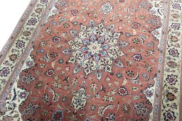 Backside of handmade New Tabriz 50/60/70 Raj rug showing knot structure and weave density