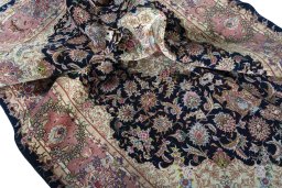 Surface texture of New Tabriz 50/60/70 Raj rug with natural Cork and intricate pattern