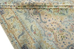 Backside of handmade New Tabriz 50/60/70 Raj rug showing knot structure and weave density