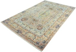 Corner detail of New Tabriz 50/60/70 Raj rug showing border pattern and Cork pile