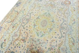 Backside of handmade New Tabriz 50/60/70 Raj rug showing knot structure and weave density