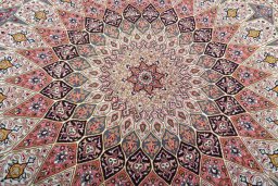 Backside of handmade New Tabriz 50/60/70 Raj rug showing knot structure and weave density