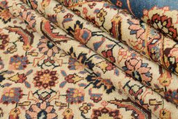 Corner detail of 1930s Tabriz Petag rug showing border pattern and Wool pile