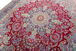 Backside of handmade 1970s Kerman rug showing knot structure and weave density
