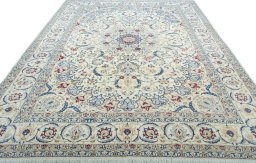 Surface texture of 2000s Nain rug with natural Wool and intricate pattern