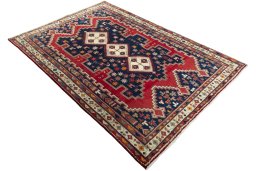 Close-up detail of 2000s Sirjan rug from Iran / Persia showing Wool weave