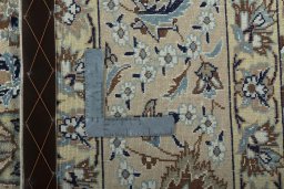 Backside of handmade 2000s Nain rug showing knot structure and weave density