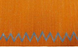 Close-up detail of New Kilim Sofre rug from Turkey showing Wool weave