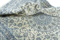 Surface texture of New Nain rug with natural Wool and intricate pattern