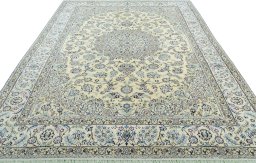 Surface texture of 2000s Nain rug with natural Wool and intricate pattern