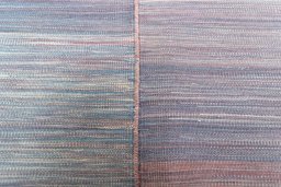 Backside of handmade New Kilim Kiasar rug showing knot structure and weave density