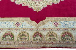 Corner detail of 1970s Kerman rug showing border pattern and Wool pile