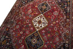 Backside of handmade 2000s Shiraz rug showing knot structure and weave density