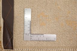 Corner detail of New Organic rug showing border pattern and Wool pile