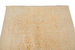 Backside of handmade New Organic rug showing knot structure and weave density