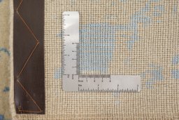 Corner detail of New Organic rug showing border pattern and Wool pile