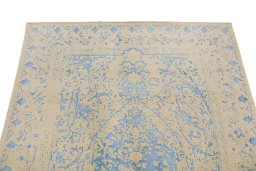Backside of handmade New Organic rug showing knot structure and weave density