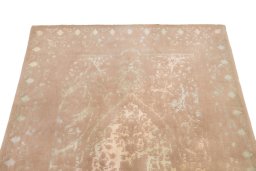 Backside of handmade New Organic rug showing knot structure and weave density