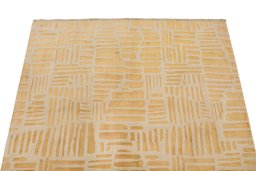 Backside of handmade New Organic rug showing knot structure and weave density