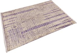 Corner detail of New Organic rug showing border pattern and Wool pile