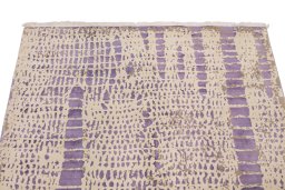 Backside of handmade New Organic rug showing knot structure and weave density