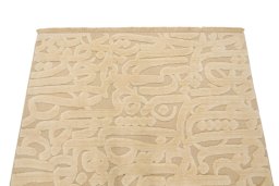 Surface texture of New Organic rug with natural Wool and intricate pattern