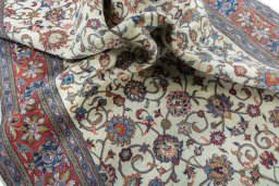 Surface texture of 2000s Sarough rug with natural Wool and intricate pattern