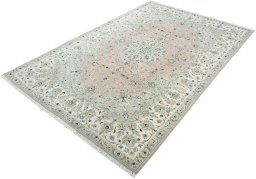 Corner detail of New Kashan rug showing border pattern and Wool pile