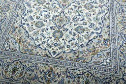 Close-up detail of 2000s Kashan rug from Iran / Persia showing Wool weave