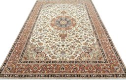 Surface texture of 2000s Tabriz 50/60/70 Raj rug with natural Cork and intricate pattern
