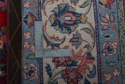 Backside of handmade 2000s Sarough rug showing knot structure and weave density
