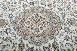 Central medallion detail of 2000s Kashan rug from Iran / Persia
