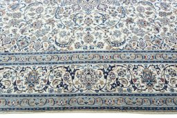 Corner detail of New Nain rug showing border pattern and Wool pile