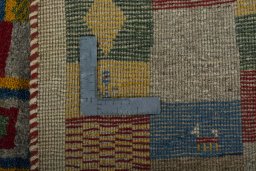 Close-up detail of 2000s Persian Gabbeh rug from Pakistan showing Wool weave