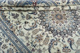 Close-up detail of New Nain rug from Iran / Persia showing Wool weave