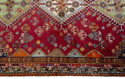 Close-up detail of 2000s Shiraz rug from Iran / Persia showing Wool weave